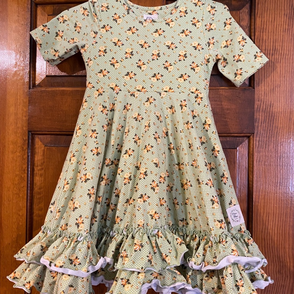 Olive Mae girls ruffle bottom dress.